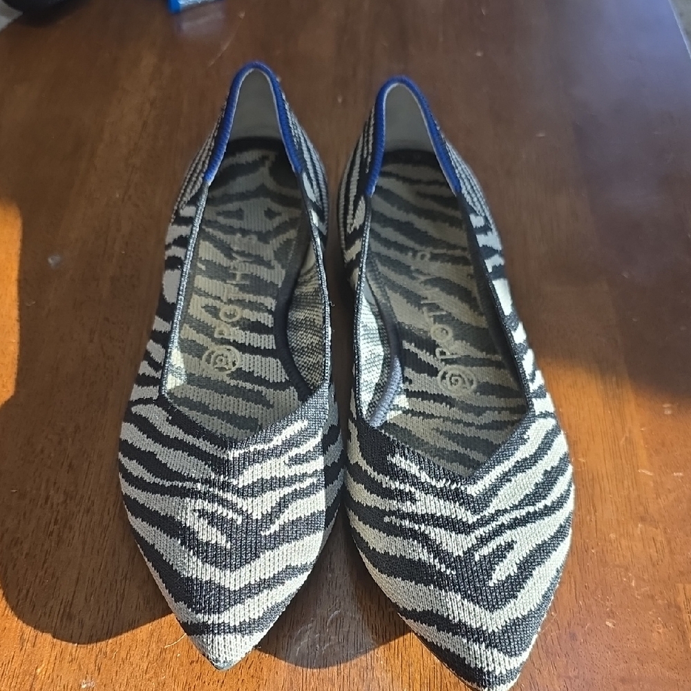 Rothy's Zebra Pattern Flats with Blue Trim
